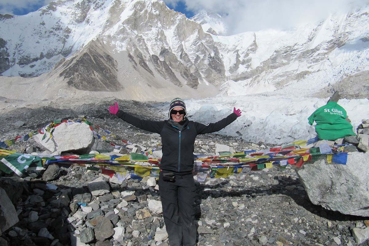 Clare in front of the prayer flags